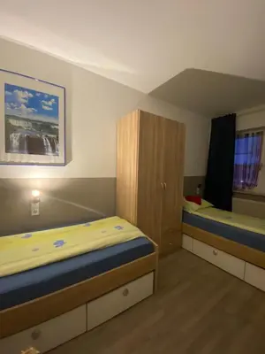 Ein Bett oder Betten in einem Zimmer der Unterkunft BOARDINGHOUSE ORANIENBURG