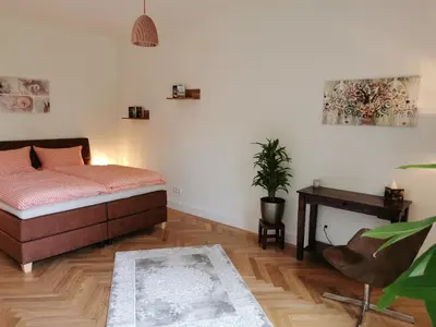 Ein Bett oder Betten in einem Zimmer der Unterkunft exklusives Studioapartment - in traumhafter Lage direkt am Halensee