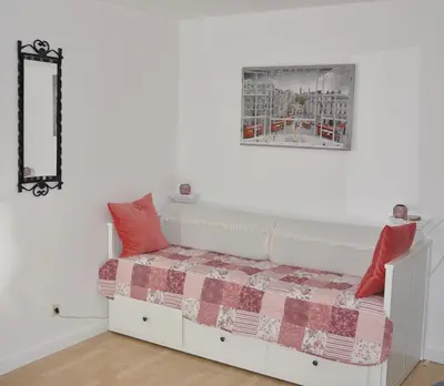 Ein Bett oder Betten in einem Zimmer der Unterkunft GardenOasisBerlinAirport