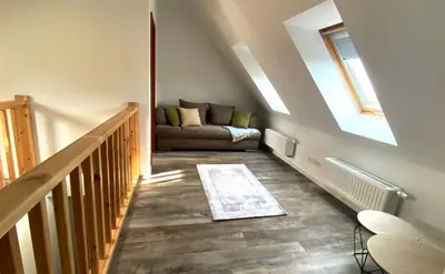 Ein Sitzbereich in der Unterkunft PRIMA Inn Ferienwohnungen Sonnenufer am Ruppiner See