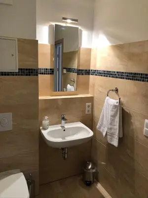 Ein Badezimmer in der Unterkunft Stilvolle Ferien-Geschäftswohnung Brandenburger Seenlandschaft