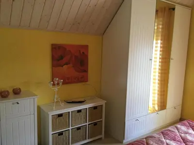 Ein Bett oder Betten in einem Zimmer der Unterkunft Ferienhaus ˋLichtblickˋ