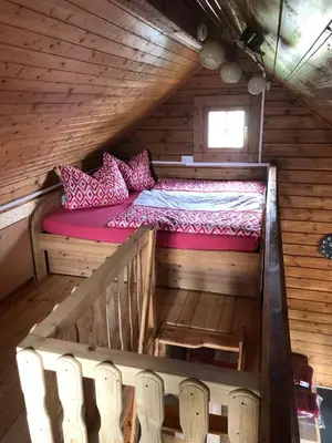 Ein Bett oder Betten in einem Zimmer der Unterkunft Ferienhaus Sterling