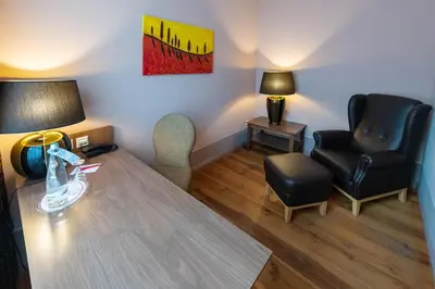 Ein Sitzbereich in der Unterkunft Hotel am Großen Waisenhaus