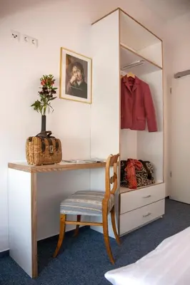 Ein Bett oder Betten in einem Zimmer der Unterkunft Gästehaus Reckahn der Rochow Akademie