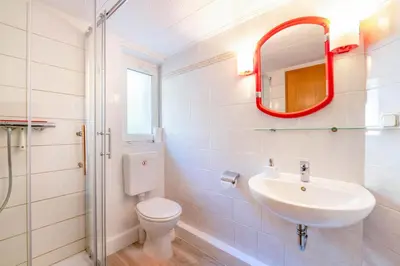 Ein Badezimmer in der Unterkunft Ferienwohnungen Behling am Schufutsberg