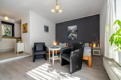 Ein Sitzbereich in der Unterkunft Ferienwohnungen Behling am Schufutsberg