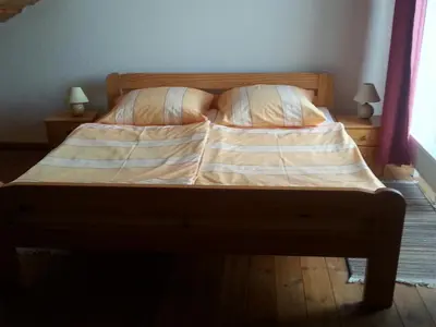 Ein Bett oder Betten in einem Zimmer der Unterkunft Ferienhof am Nationalpark