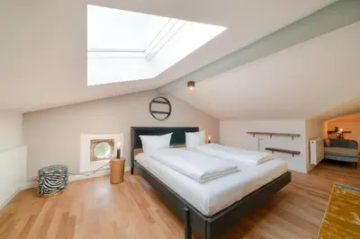 Ein Bett oder Betten in einem Zimmer der Unterkunft Design Apartments - 