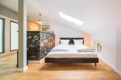 Ein Bett oder Betten in einem Zimmer der Unterkunft Design Apartments - 