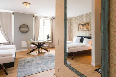 Ein Bett oder Betten in einem Zimmer der Unterkunft Design Apartments - 