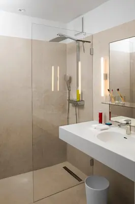 Ein Badezimmer in der Unterkunft The Mandala Suites