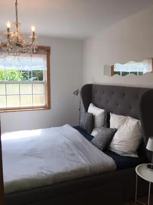 Ein Bett oder Betten in einem Zimmer der Unterkunft Ferienhaus Ahornallee