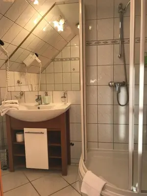 Ein Badezimmer in der Unterkunft Hotel am Schloss - Frankfurt an der Oder