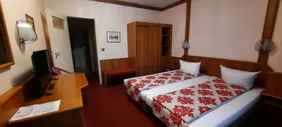 Ein Bett oder Betten in einem Zimmer der Unterkunft Miles Hotel Berlin