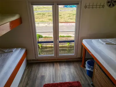 Ein Bett oder Betten in einem Zimmer der Unterkunft Shipotel-Berlin GmbH, Shipotel Eastern & Shipotel Western