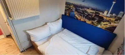 Ein Bett oder Betten in einem Zimmer der Unterkunft Shipotel-Berlin GmbH, Shipotel Eastern & Shipotel Western