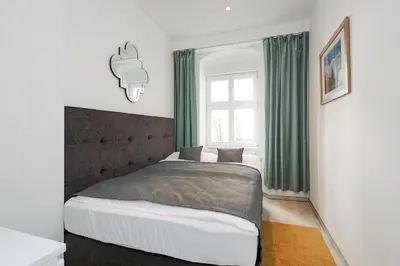 Ein Bett oder Betten in einem Zimmer der Unterkunft 4 Personen Altbau nahe Kurfürstendamm - Macbeth
