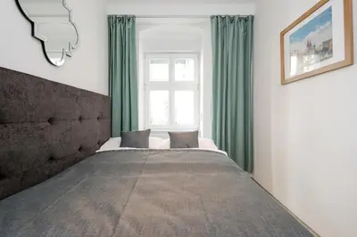 Ein Bett oder Betten in einem Zimmer der Unterkunft 4 Personen Altbau nahe Kurfürstendamm - Macbeth