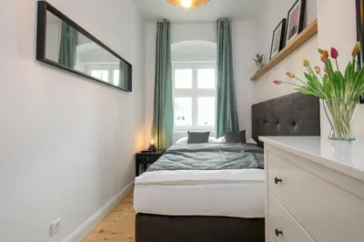 Ein Bett oder Betten in einem Zimmer der Unterkunft 4 Personen Altbau Apartment nahe Kurfürstendamm - Romeo & Julia