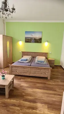 Ein Bett oder Betten in einem Zimmer der Unterkunft Ferienwohnung