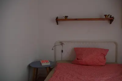 Ein Bett oder Betten in einem Zimmer der Unterkunft Haus im Grünen Meer