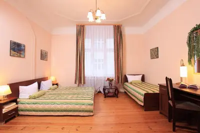 Ein Bett oder Betten in einem Zimmer der Unterkunft Hotel Central Inn am Hauptbahnhof Pension