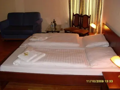Ein Bett oder Betten in einem Zimmer der Unterkunft Hotel Central Inn am Hauptbahnhof Pension