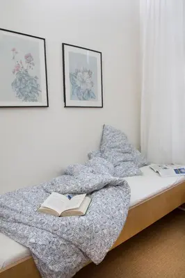Ein Bett oder Betten in einem Zimmer der Unterkunft Jugendgästehaus des CVJM Berlin-Kaulsdorf