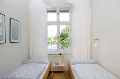 Ein Bett oder Betten in einem Zimmer der Unterkunft Jugendgästehaus des CVJM Berlin-Kaulsdorf