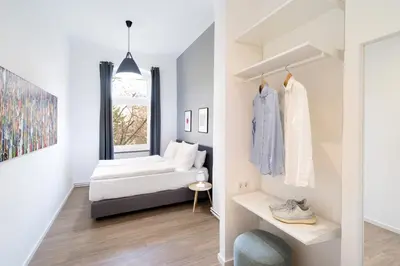 Ein Bett oder Betten in einem Zimmer der Unterkunft BENSIMON apartments Mitte/Wedding