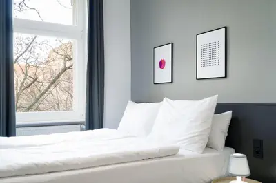 Ein Bett oder Betten in einem Zimmer der Unterkunft BENSIMON apartments Mitte/Wedding