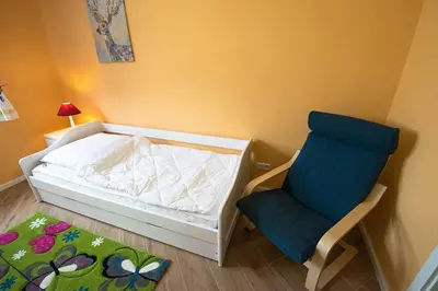 Ein Bett oder Betten in einem Zimmer der Unterkunft Ferienhaus mit Terrasse und Garten in Wandlitz