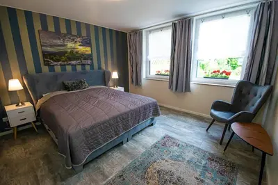Ein Bett oder Betten in einem Zimmer der Unterkunft Ferienhaus mit Terrasse und Garten in Wandlitz