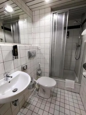 Ein Badezimmer in der Unterkunft Les Nations