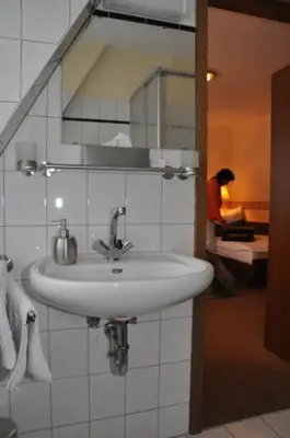 Ein Badezimmer in der Unterkunft Hotel 4 Hufen