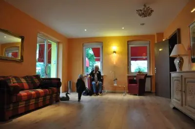 Ein Sitzbereich in der Unterkunft Hotel 4 Hufen