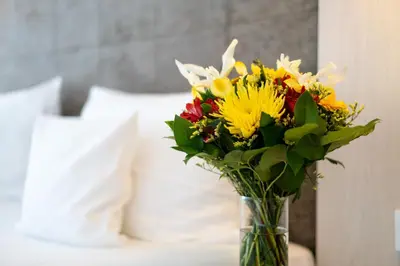 Ein Bett oder Betten in einem Zimmer der Unterkunft Kongresshotel Potsdam am Templiner See