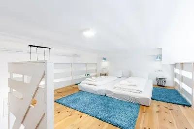 Ein Bett oder Betten in einem Zimmer der Unterkunft DR Apartments Prenzlauer Berg