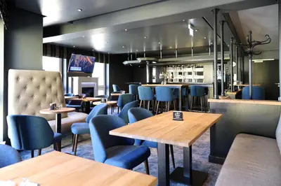 Ein Sitzbereich in der Unterkunft Hotel Märkischer Hof