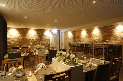 Ein Restaurant oder anderes Speiselokal in der Unterkunft Hotel Märkischer Hof