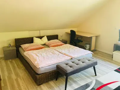 Ein Bett oder Betten in einem Zimmer der Unterkunft An der Glocke