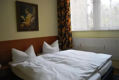 Ein Bett oder Betten in einem Zimmer der Unterkunft Pension ABC