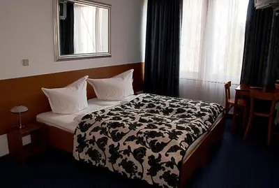 Ein Bett oder Betten in einem Zimmer der Unterkunft Pension ABC