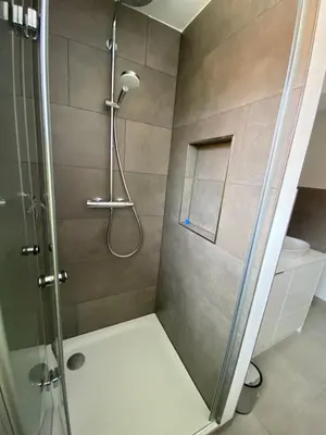 Ein Badezimmer in der Unterkunft Über den Dächern von Eichwalde