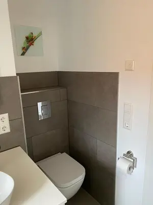 Ein Badezimmer in der Unterkunft Über den Dächern von Eichwalde