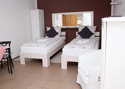 Ein Bett oder Betten in einem Zimmer der Unterkunft Fahrradpension-Joachimsthal