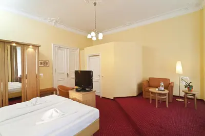Ein Bett oder Betten in einem Zimmer der Unterkunft Hotel Vivaldi Berlin am Kurfürstendamm
