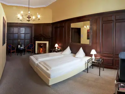 Ein Bett oder Betten in einem Zimmer der Unterkunft Hotel Vivaldi Berlin am Kurfürstendamm