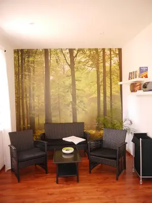 Ein Sitzbereich in der Unterkunft Hotel & Restaurant Lindengarten